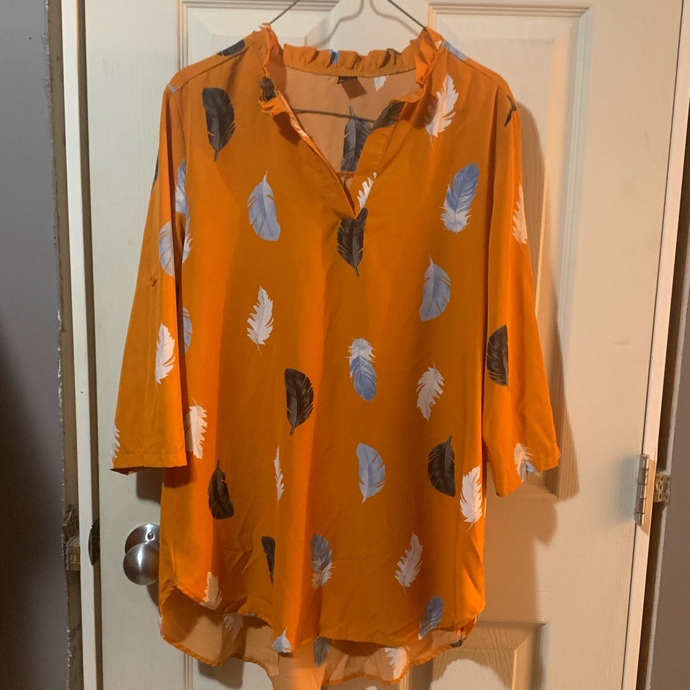 Pretty tunic top. Light weight.